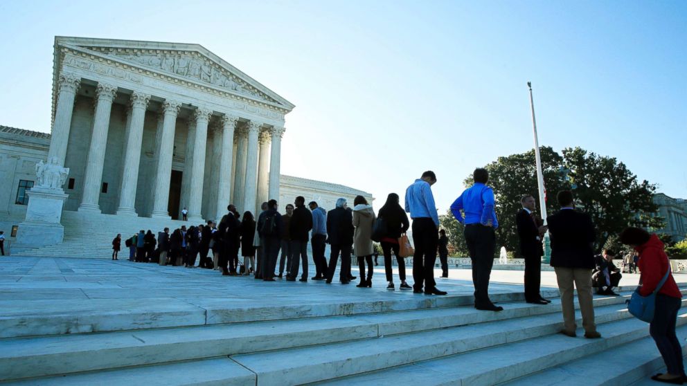 PHOTO: People line up outside the U.S. Supreme Court in Washington to hear arguments in a case about political maps in Wisconsin that could affect elections across the country, Oct. 3, 2017.