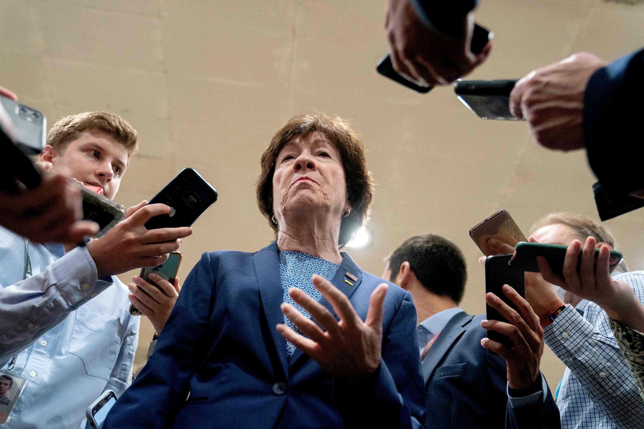 PHOTO: Sen. Susan Collins speaks to reporters in the Senate Subway at the US Capitol in Washington, DC, on September 14, 2022.