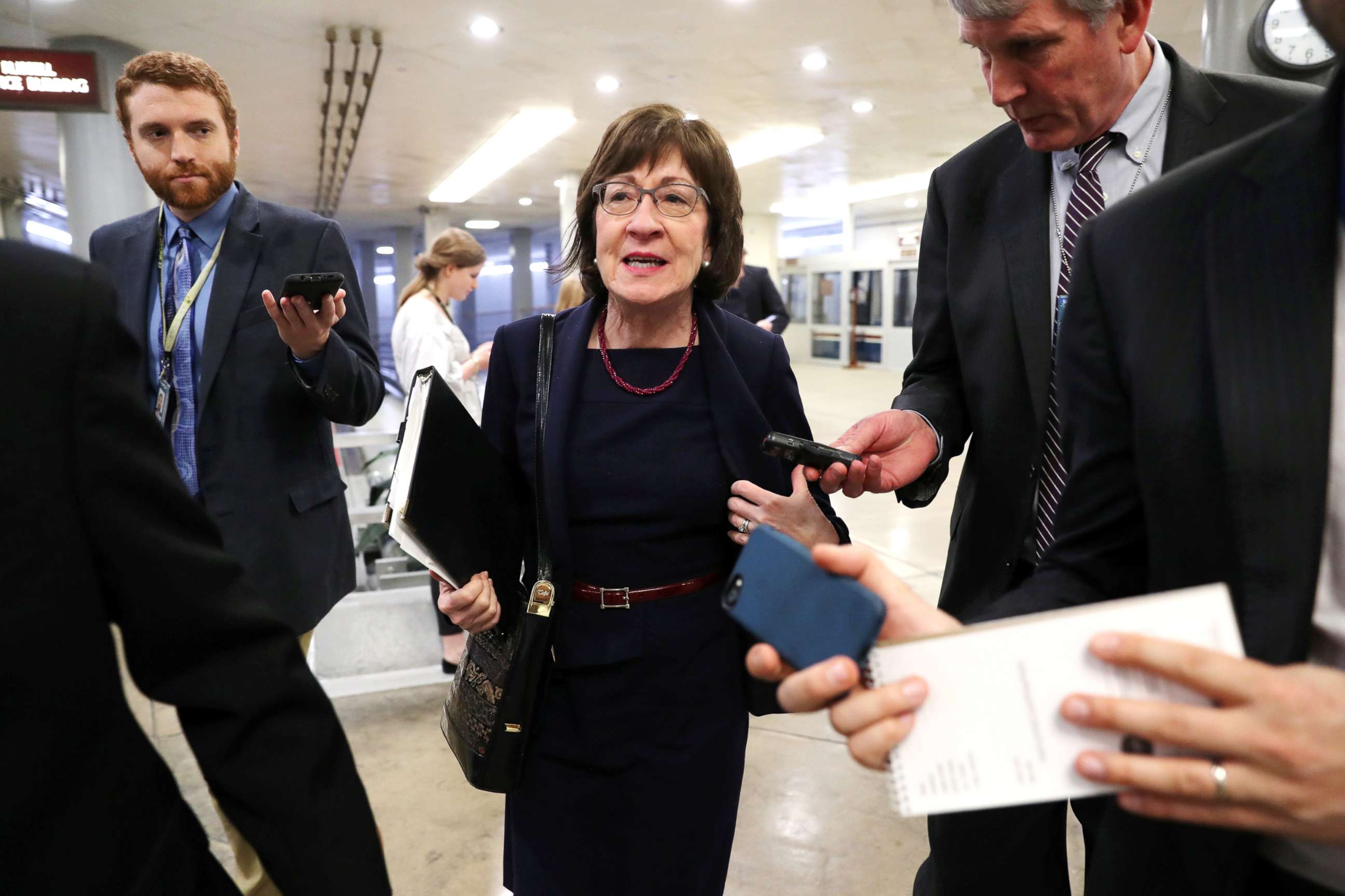 PHOTO: Senator Susan Collins speaks to reporters as she arrives for the weekly Republican Party caucus luncheon at the U.S. Capitol in Washington, Feb. 26, 2019.