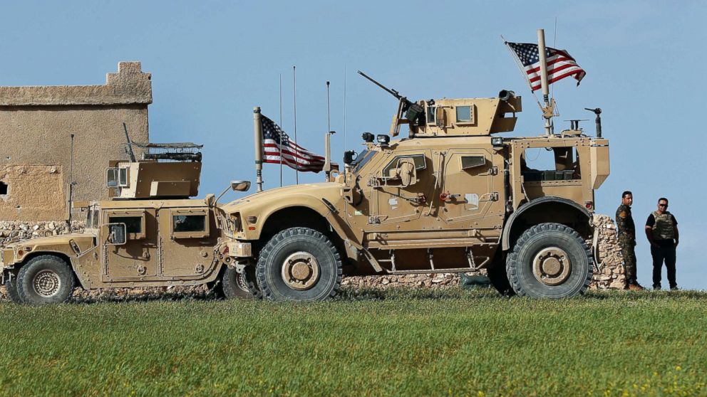 A U.S. humvee is pictured at a U.S. troop's outpost on a road leading to the tense front line between Syrian Manbij Military Council fighters and Turkish-backed fighters, March 29, 2018, at Halawanji village, north of Manbij town, Syria. The front line has grown more tense in recent days as Turkey threatens to advance on the town to clear it of the U.S-backed fighters. 