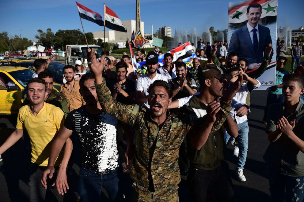 PHOTO: Thousands of Syrians gather at the Umayyad Square in Damascus, Syria, on June 11, 2020, in support of President Bashar Assad and to denounce the Caesar Act which is scheduled to be put in force on June 17.