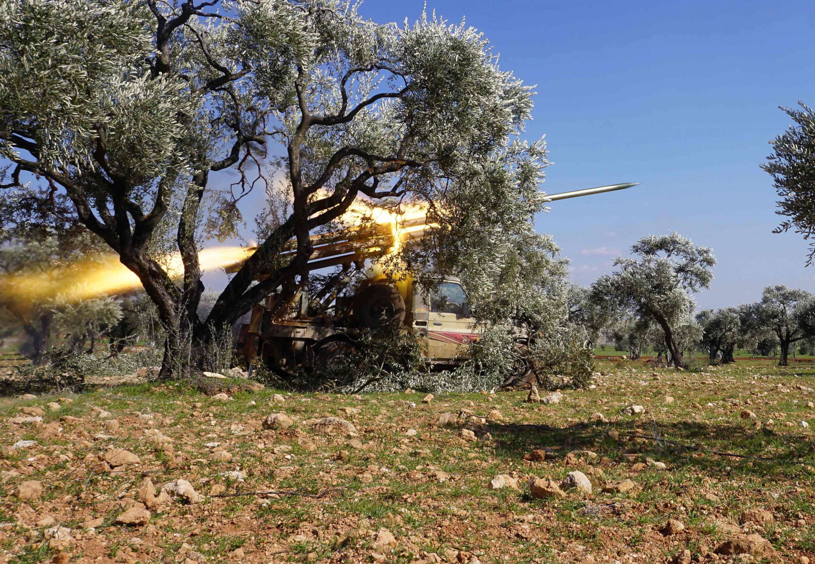 PHOTO: Members of Syria's opposition National Liberation Front remotely-fire a rocket at a position near the village of al-Nayrab, southeast of the city of Idlib in northwestern Syria, Feb. 20, 2020.