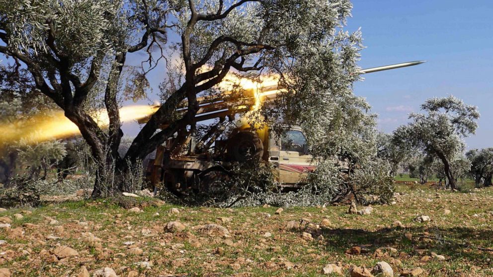 PHOTO: Members of Syria's opposition National Liberation Front remotely-fire a rocket at a position near the village of al-Nayrab, southeast of the city of Idlib in northwestern Syria, Feb. 20, 2020.