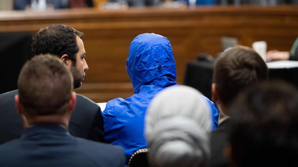 PHOTO: A Syrian military defector using the pseudonym Caesar, while also wearing a hood to protect his identity, testifies about the war in Syria during a Senate Foreign Relations committee hearing on Capitol Hill, March 11, 2020. 