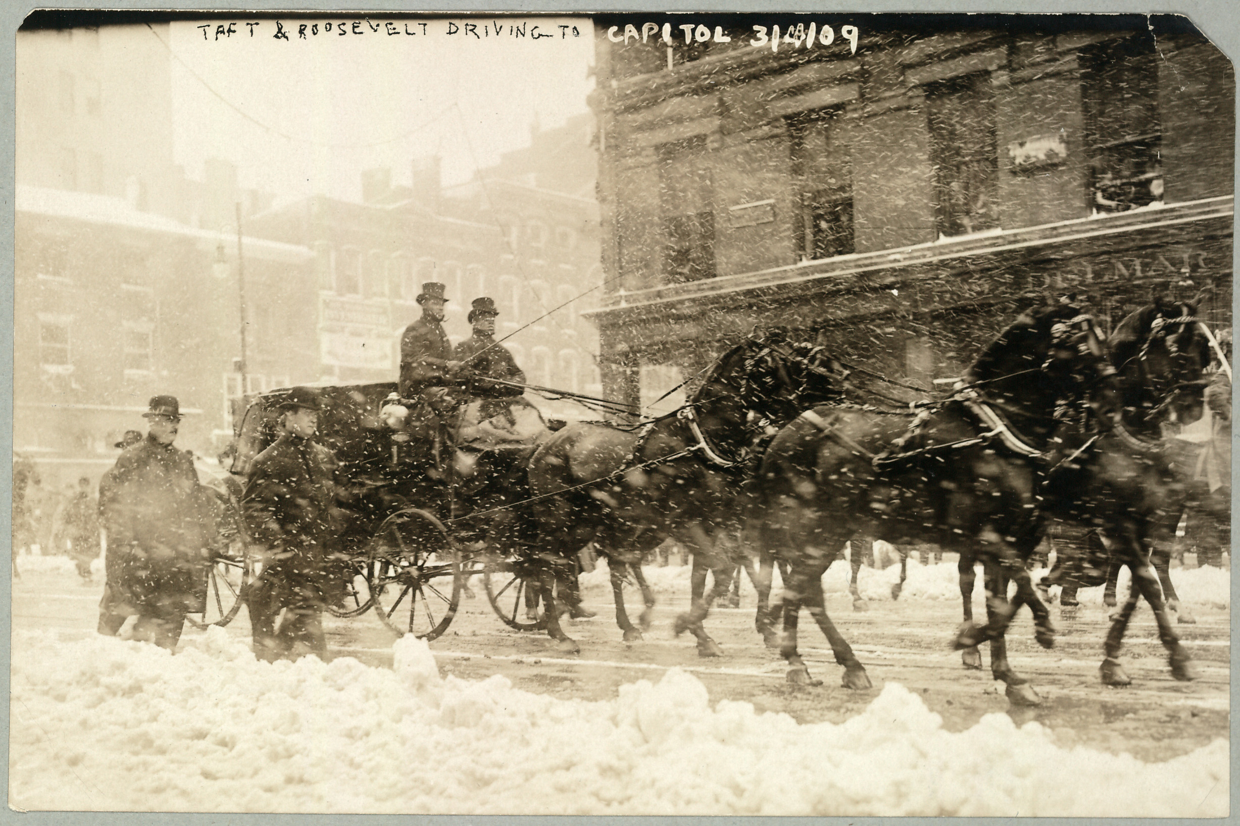 PHOTO: On their way to his inauguration, President-elect William Howard Taft and outgoing President Theodore Roosevelt ride in a carriage along the snowy streets towards the US Capitol in Washington D.C., March 4, 1909.