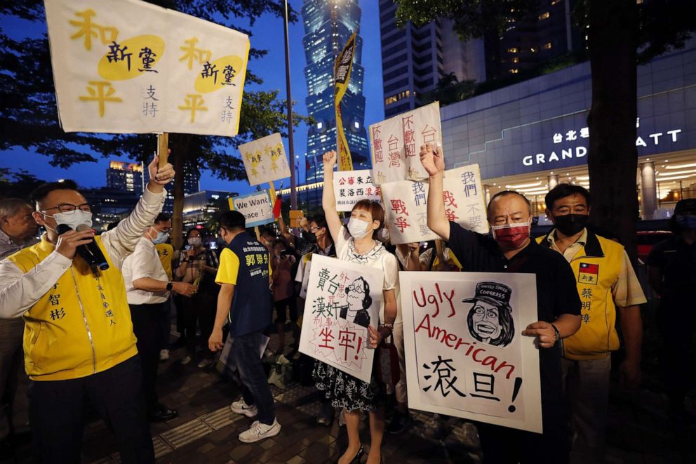PHOTO: Demonstrators hold placards during a protest against the visit of U.S. House Speaker Nancy Pelosi, in Taipei, Taiwan, Aug. 2, 2022.