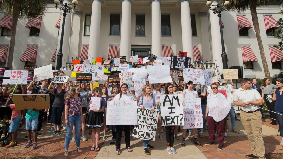 Hundreds of protesters gather at the Florida state Capitol in Tallahassee on Feb. 21, 2018 to push for legislation regulating assault-style weapons and guns in general, after seventeen people were killed by a gunman at Marjory Stoneman Douglas High School on Feb. 14, 2018, in Parkland, Fla.