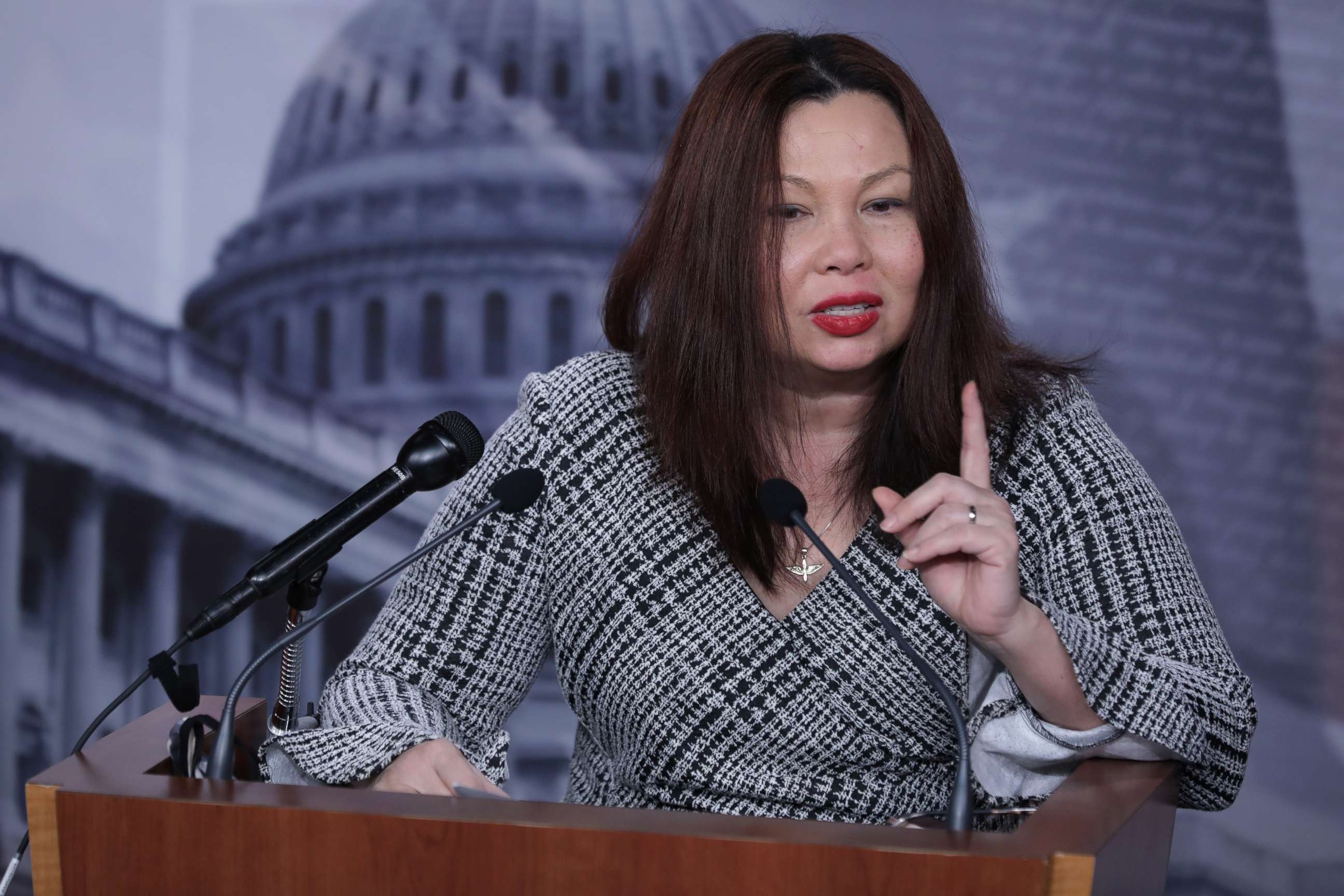 PHOTO: Sen. Tammy Duckworth talks to reporters during a news conference at the U.S. Capitol on Nov. 17, 2020, in Washington.