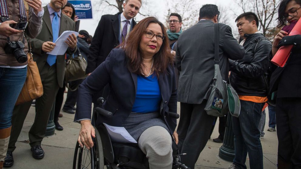 PHOTO: Sen. Tammy Duckworth arrives to speak outside the Supreme Court in support of a same-sex couple whose request for a wedding cake was denied by a Colorado baker who sited his religious beliefs were protected by the First Amendment, Dec. 5, 2017.
