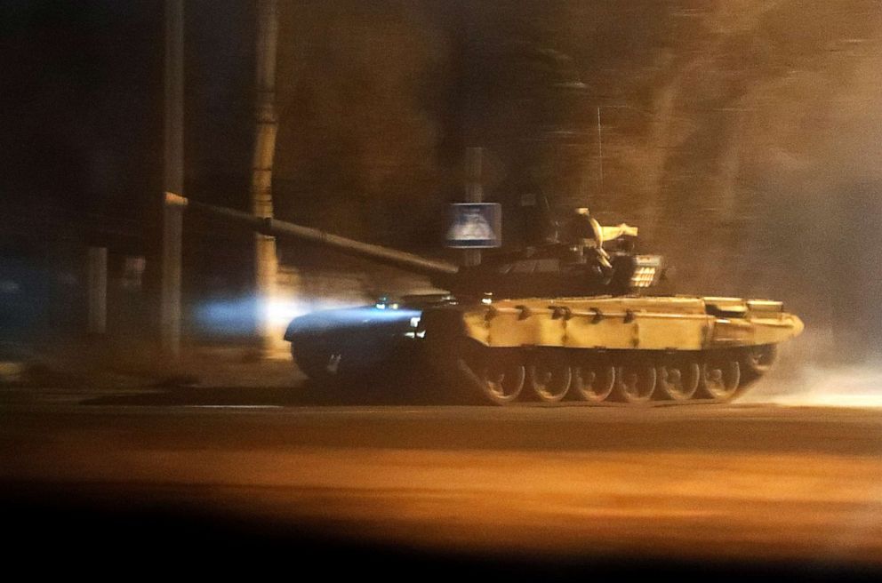 PHOTO: A tank drives along a street in the separatist-controlled city of Donetsk, Ukraine, Feb. 22, 2022.