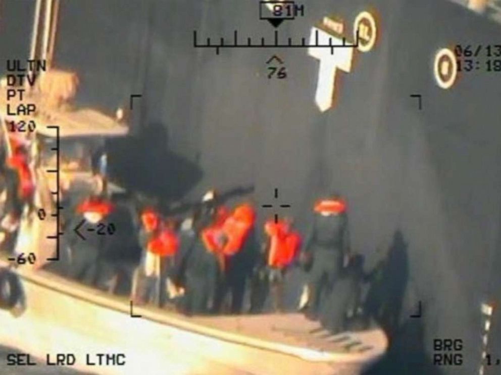 PHOTO: Imagery taken from a U.S. Navy MH-60R helicopter of the Islamic Revolutionary Guard Corps Navy removing an unexploded limpet mine from the M/T Kokuka Courageous.