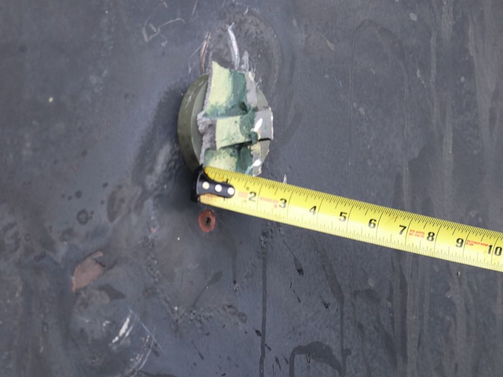 PHOTO: This photo depicts the aluminum and green composite material left behind following removal of an unexploded limpet mine used in an attack on the starboard side of motor vessel M/T Kokuka Courageous, while operating in the Gulf of Oman, June 13th.