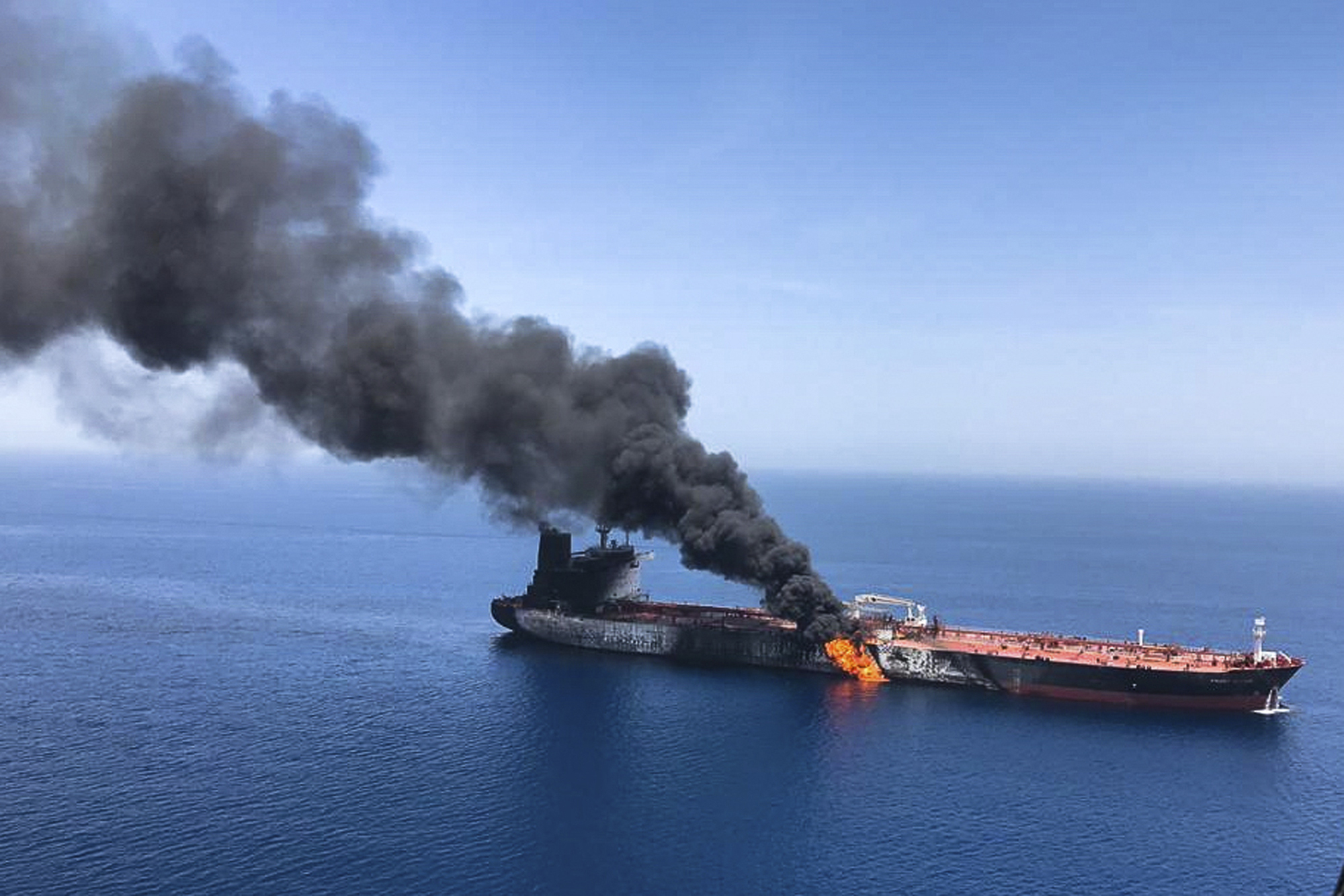 PHOTO: An oil tanker is on fire in the sea of Oman, June 13, 2019.