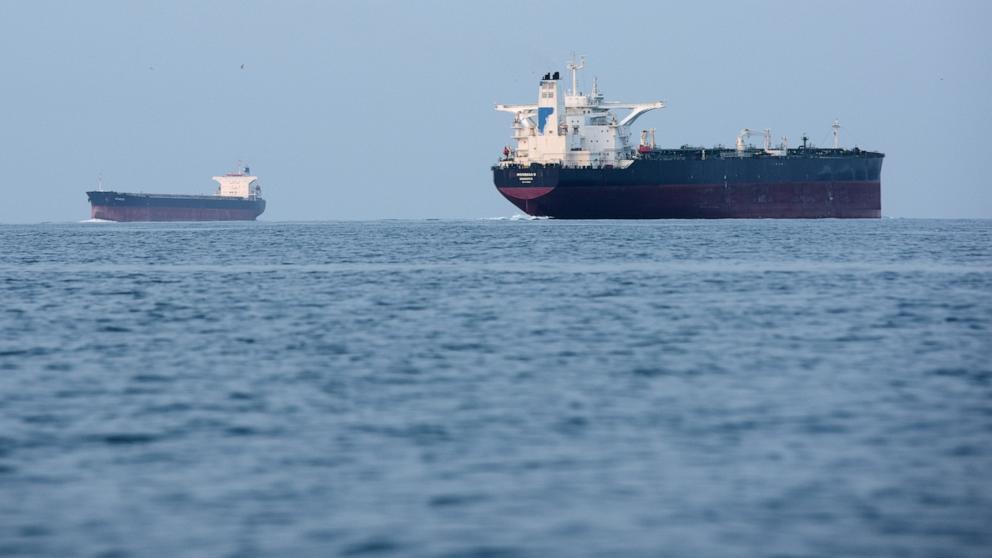 PHOTO: Tankers anchored in the Strait of Hormuz off the coast of Qeshm Island, Iran, Saturday, April 18, 2026. 