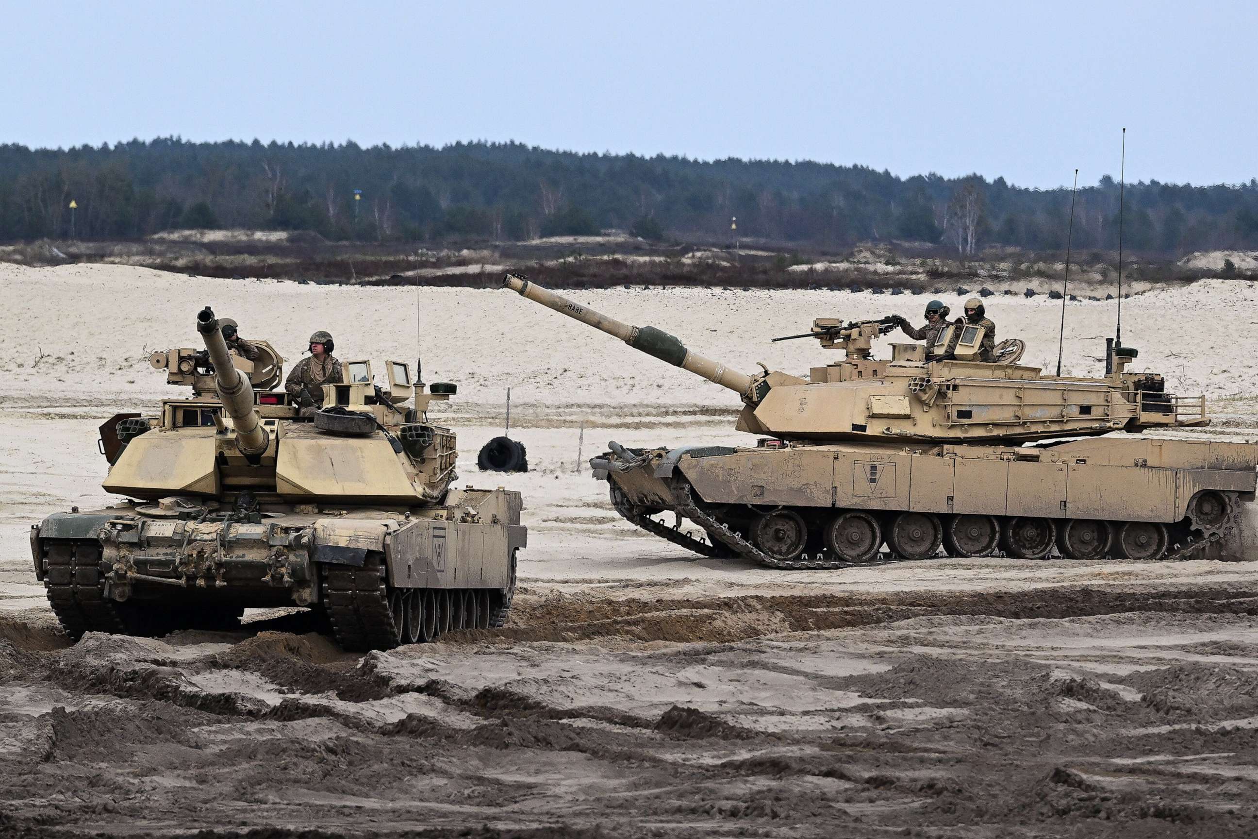 PHOTO: Polish and American soldiers during the training using, among other things, Abrams tanks at a training site in Nowa Deba, southeast Poland, April 12, 2023.