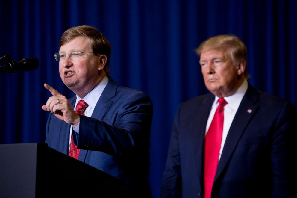 PHOTO: Mississippi Lt. Gov. Tate Reeves, left, accompanied by President Donald Trump speaks at a rally at BancorpSouth Arena in Tupelo, Miss., Nov. 1, 2019.