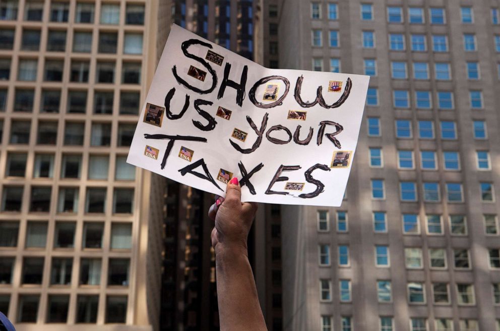PHOTO: Protesters demand President Donald J. Trump release his income tax returns, at a rally in New York City, April 15, 2017.