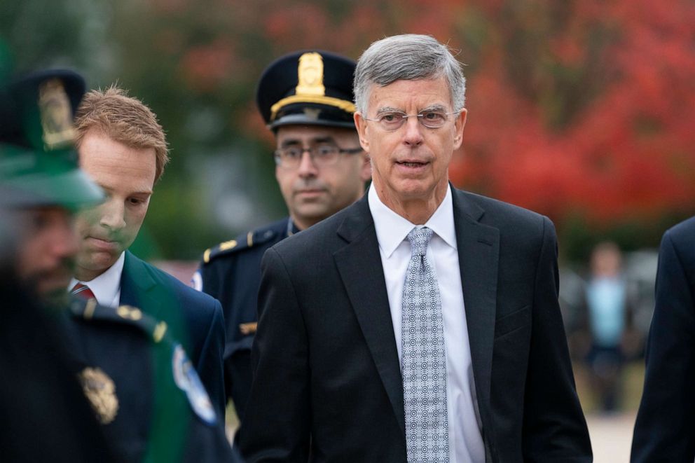 PHOTO: Ambassador William Taylor, is escorted by Capitol Police as he arrives to testify before House committees as part of the Democrats' impeachment investigation of President Donald Trump, at the Capitol, Oct. 22, 2019. 