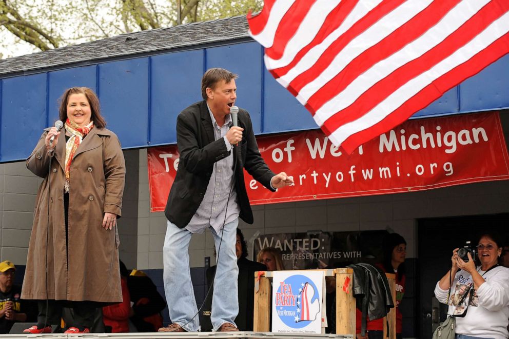 PHOTO: Amy Kremer, co-founder of the Tea Party Patiots, and Mark Williams, chair of the Tea Party Express, rally the crowd during the Tea Party Express's visit to Riverside Park in Grand Rapids, Michigan, April 10, 2010.