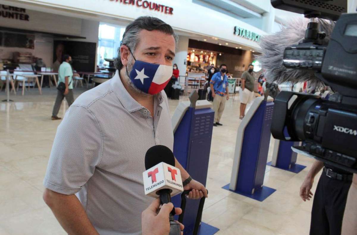 PHOTO: Sen. Ted Cruz speaks to the media at the Cancun International Airport before boarding his plane back to the U.S., Feb. 18, 2021, in Cancun, Mexico.