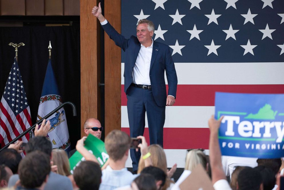 PHOTO: Virginia gubernatorial candidate Terry McAuliffe arrives to give remarks at a campaign event at the Lubber Run Community Center on July 22, 2021 in Arlington, Va.