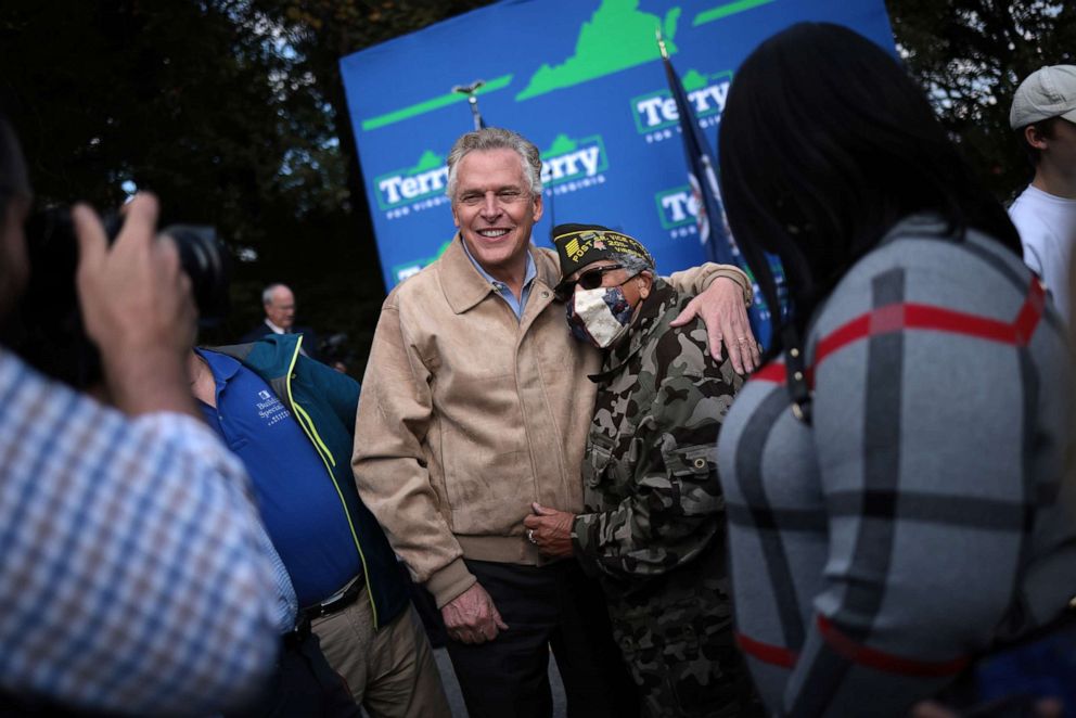 PHOTO: Democratic gubernatorial candidate, former Virginia Gov. Terry McAuliffe greets supporters after speaking at a campaign event at Sweet Donkey Coffee, on Nov. 1, 2021, in Roanoke, Va.