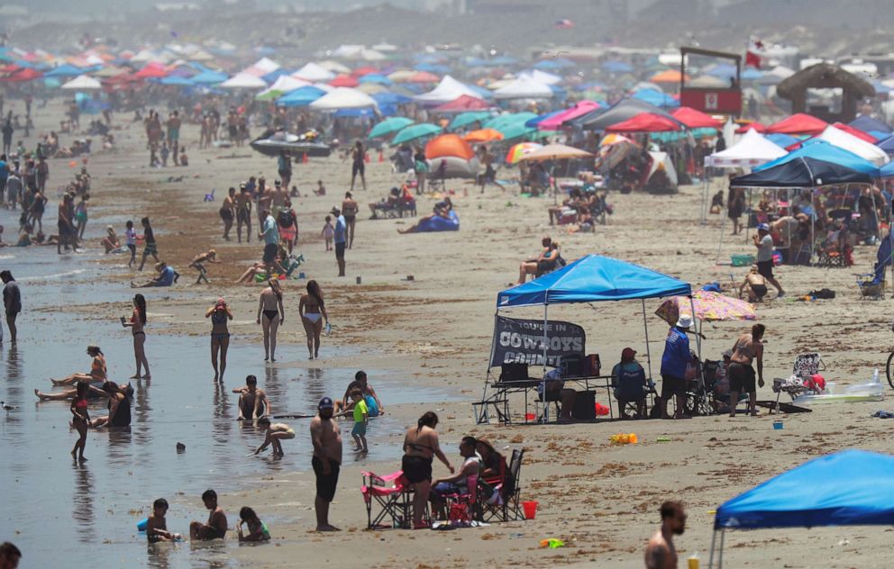 PHOTO: People gather on the beach for the Memorial Day weekend in Port Aransas, Texas, May 23, 2020.