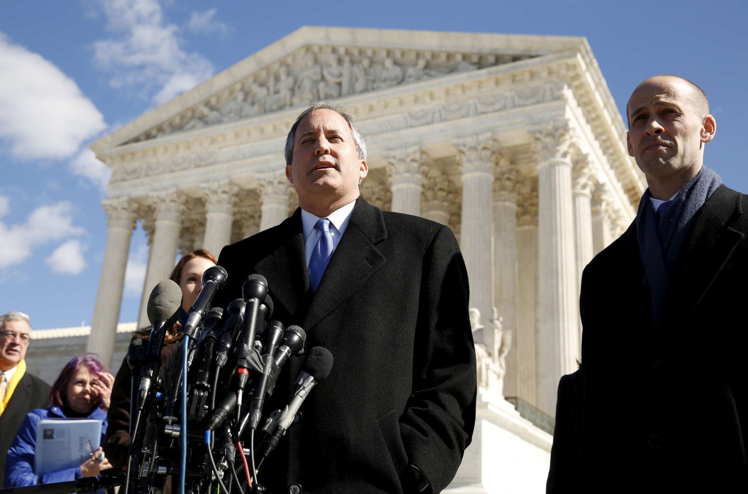 PHOTO: Texas Attorney General Ken Paxton addresses reporters on the steps of the U.S. Supreme Court after the court took up a major abortion case focusing on a Texas law, March 2, 2016, in Washington.