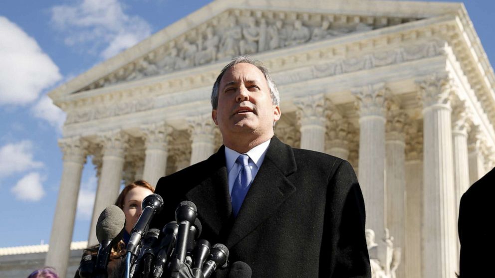 PHOTO: Texas Attorney General Ken Paxton addresses reporters on the steps of the U.S. Supreme Court after the court took up a major abortion case focusing on a Texas law, March 2, 2016, in Washington.
