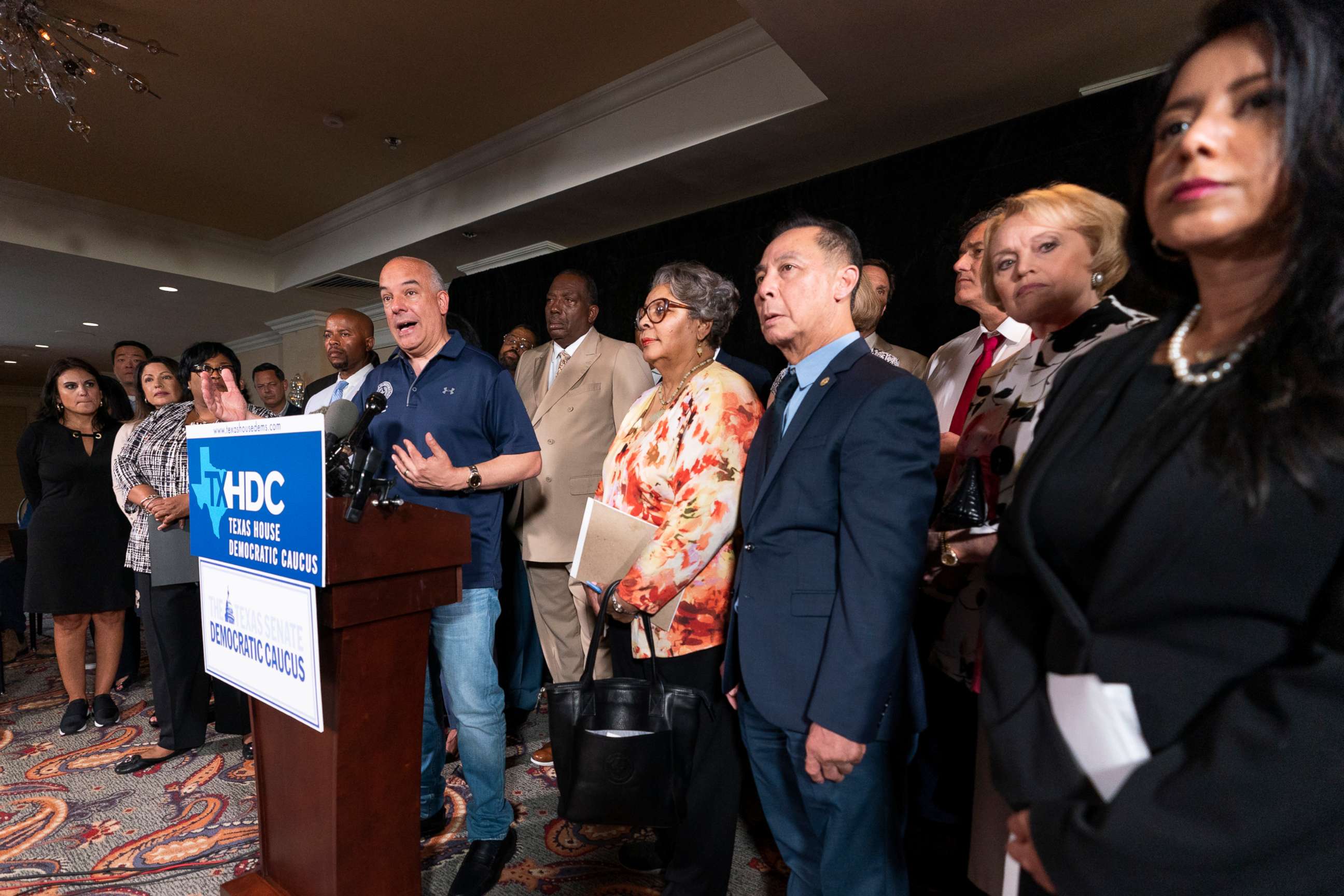 PHOTO: In this July 14, 2021, file photo, Democratic Texas State Rep. Chris Turner, left, from Grand Prairie, speaks during a news conference with other Texas Democrats in Washington, D.C.