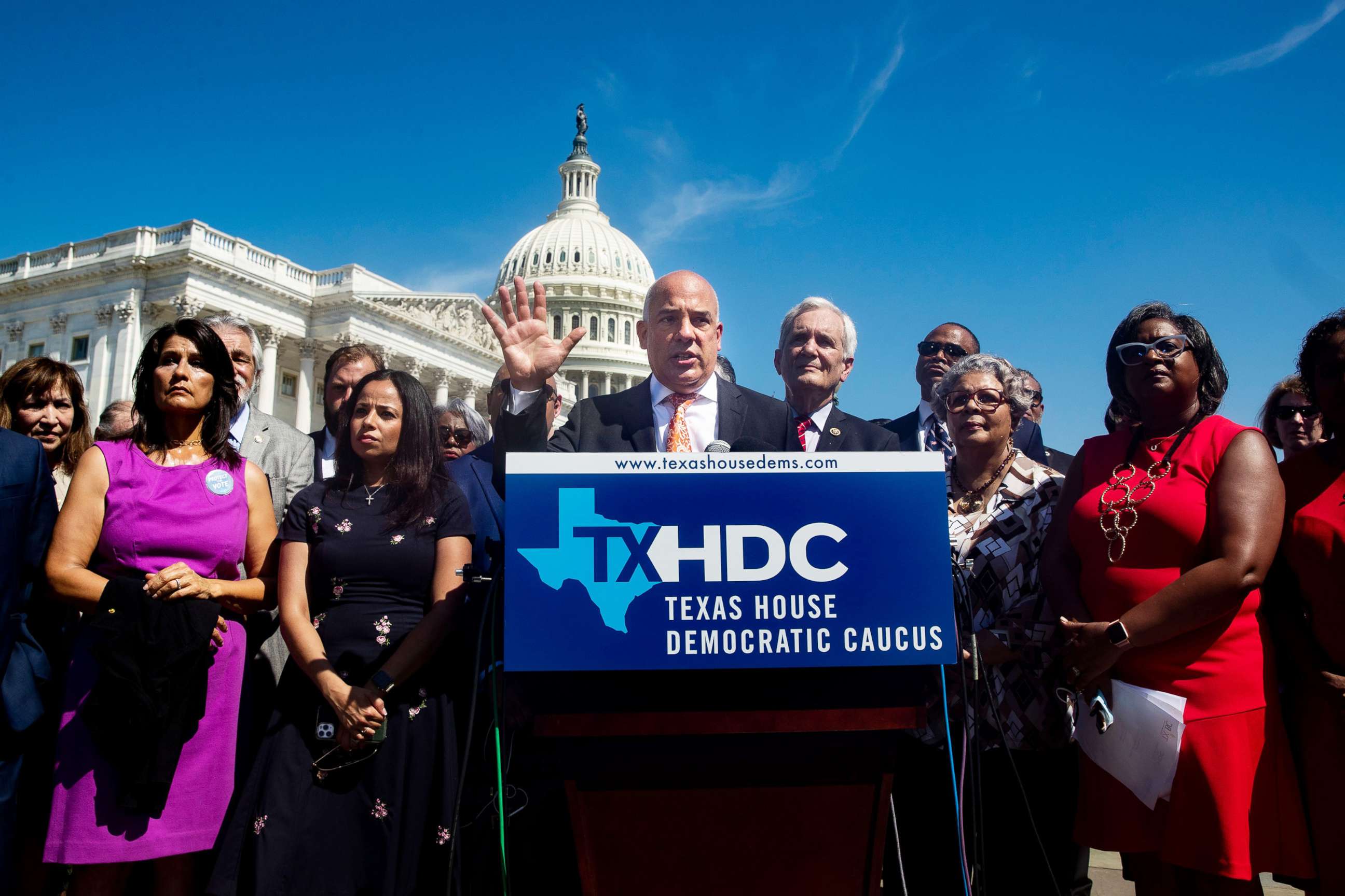 PHOTO: Chair of the Texas House Democratic Caucus Chris Turner, center, speaks at a news conference held by Democratic members of the Texas state legislature, outside the United States House of Representatives on Capitol Hill in Washington, July 13, 2021.