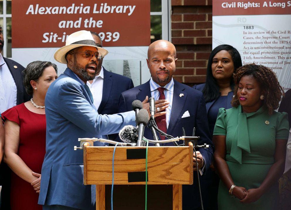 Texas State Sen. Borris Miles, left, introduces Rep. Ron Reynolds at a press conference on voting rights alongside state representatives from Texas, Maryland and Virginia, on July 16, 2021 in Alexandria, Virginia. 