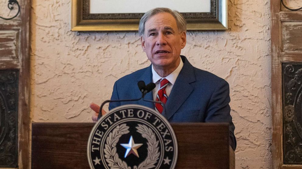 PHOTO: Texas Governor Greg Abbott delivers an announcement on March 2, 2021, in Lubbock, Texas. Abbott announced that he is rescinding executive orders that limit capacities for businesses and the state wide mask mandate.