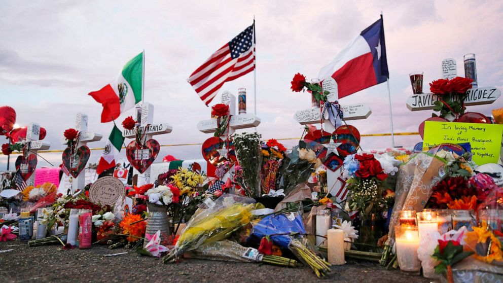 PHOTO: Flags fly over crosses at a makeshift memorial near the scene of a mass shooting at a shopping complex Tuesday, Aug. 6, 2019, in El Paso, Texas.