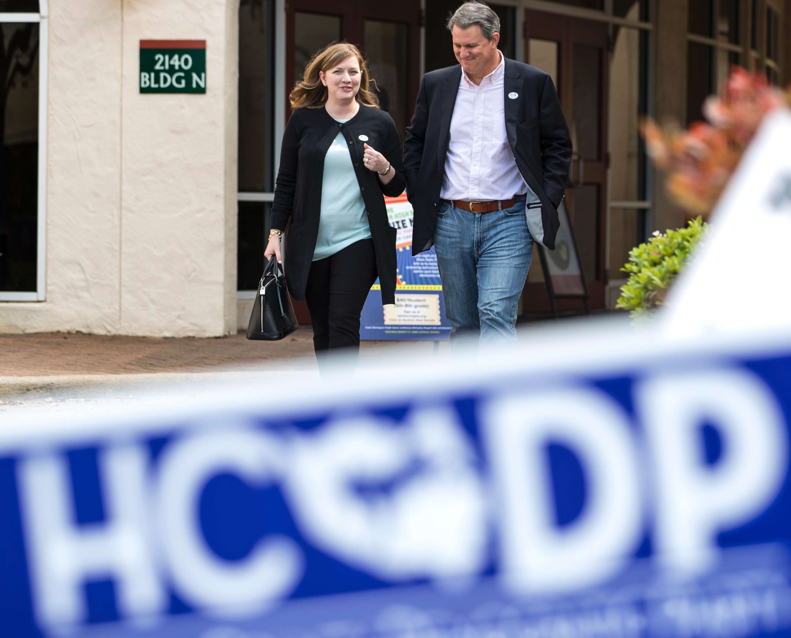 PHOTO: Lizzie Pannill Fletcher, a Democrat running for the 7th Congressional District seat in the U.S. House of Representatives, and her husband, Scott Fletcher, after voting in the primary election in Houston, March 6, 2018.