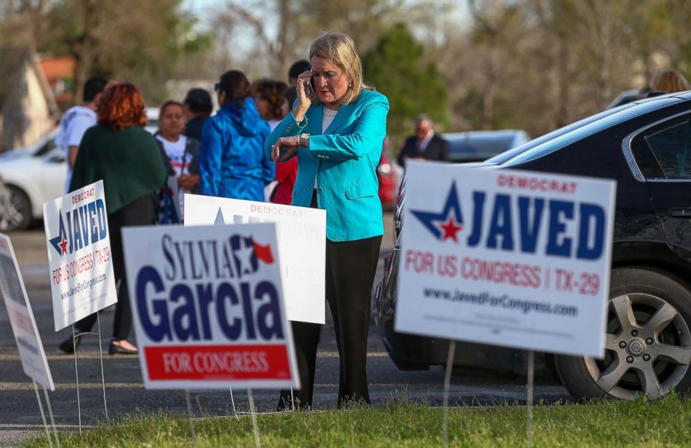 PHOTO: Senator Sylvia Garcia tries to reach officials to fix polling machines and allow constituents to vote at the Montie Beach Community Center on  March 6, 2018, in Houston.