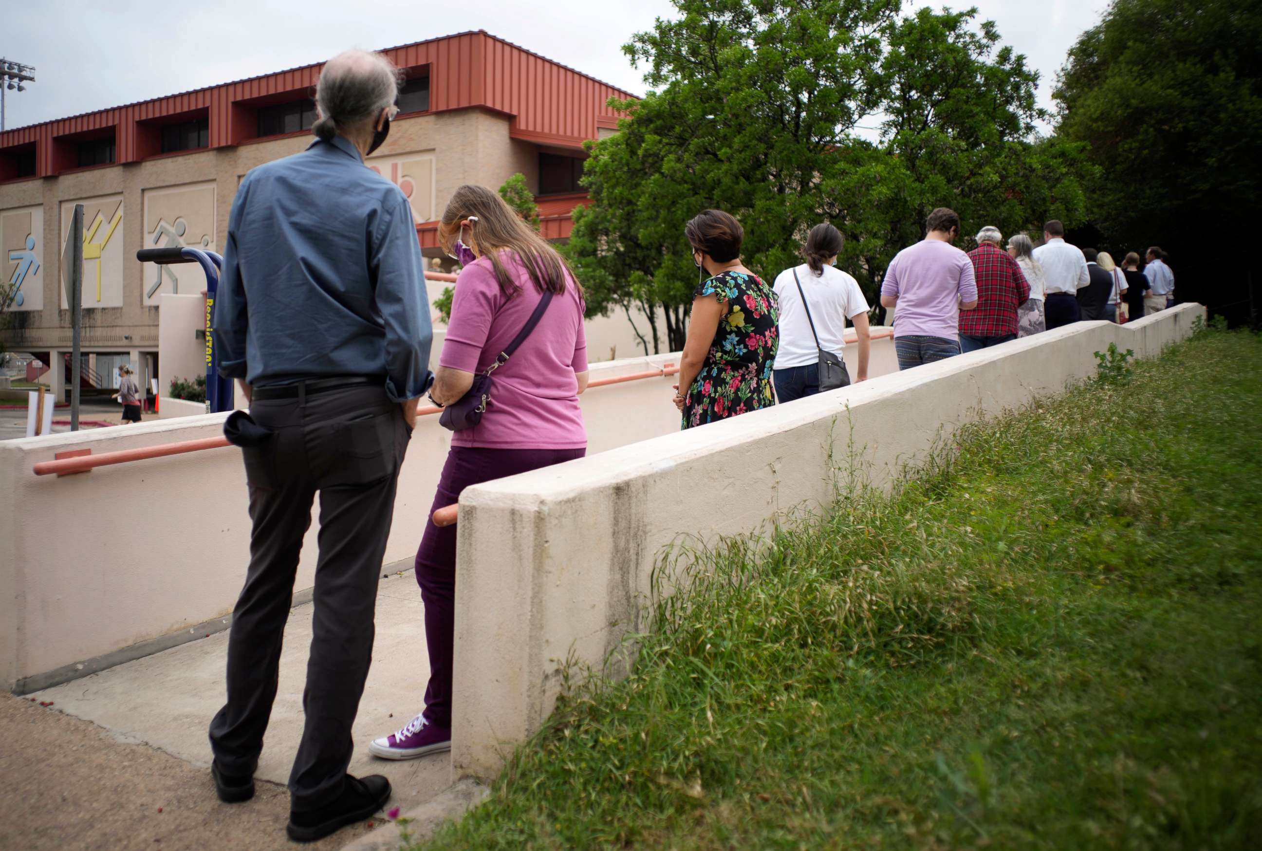 PHOTO: Austin, Texas residents line up in record numbers, April 27, 2021, for early voting on municipal issues.