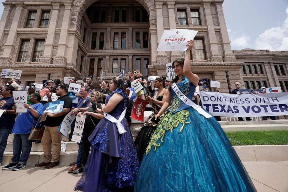 PHOTO: People rally to protest proposed voting bills on the steps of the Texas Capitol, July 13, 2021, in Austin, Texas.