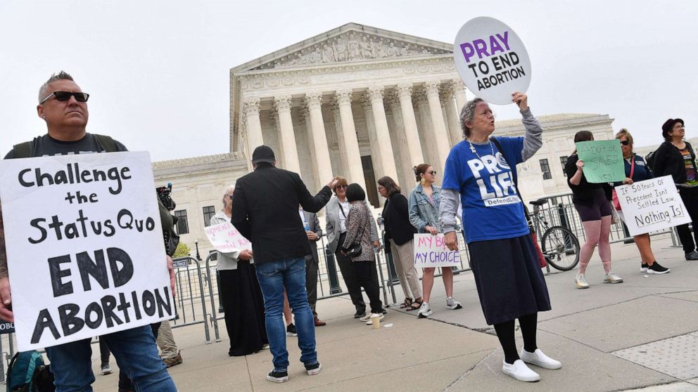 PHOTO: Pro-choice and anti-abortion demonstrators gather outside the US Supreme Court in Washington, May 4, 2022. 