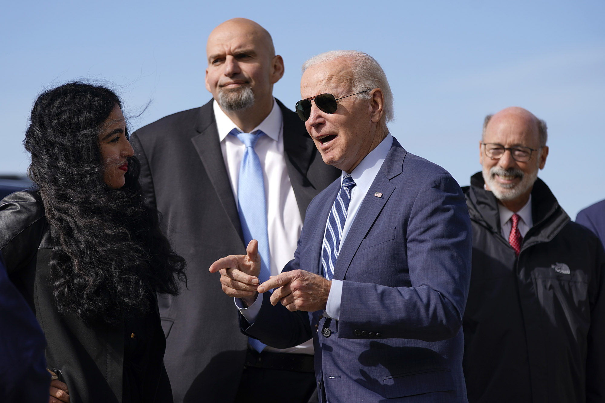 PHOTO: President Joe Biden talks with Pennsylvania Lt. Gov. John Fetterman, a Democratic candidate for U.S. Senate, and his wife Gisele Barreto Fetterman, as he arrives in Coraopolis, Pa., Oct. 20, 2022.