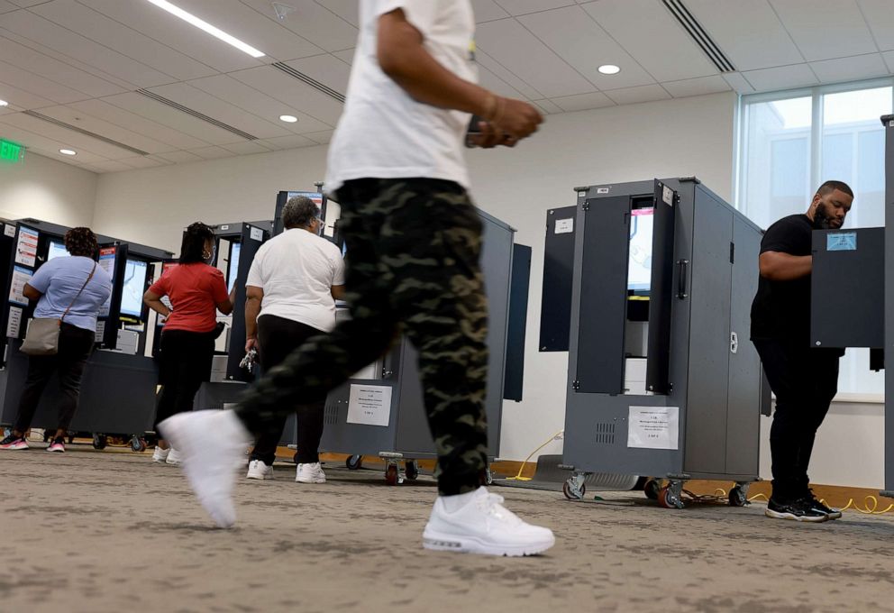 PHOTO: People use voting machines to fill out their ballots as they vote in the Georgia primary in Atlanta, May 24, 2022.