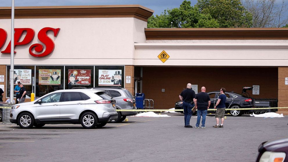 PHOTO: Police officers secure the scene after a shooting at TOPS supermarket in Buffalo, N.Y., May 15, 2022.