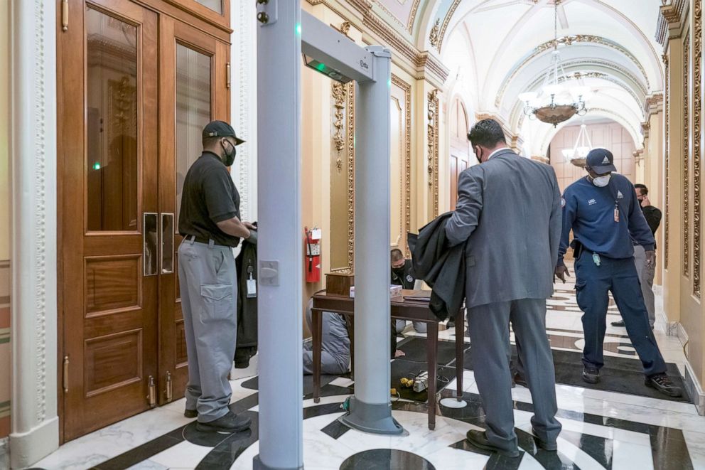 PHOTO: Metal detectors for lawmakers are installed in the corridor around the House of Representatives chamber after a mob loyal to President Donald Trump stormed the Capitol last week, in Washington, Jan. 12, 2021.