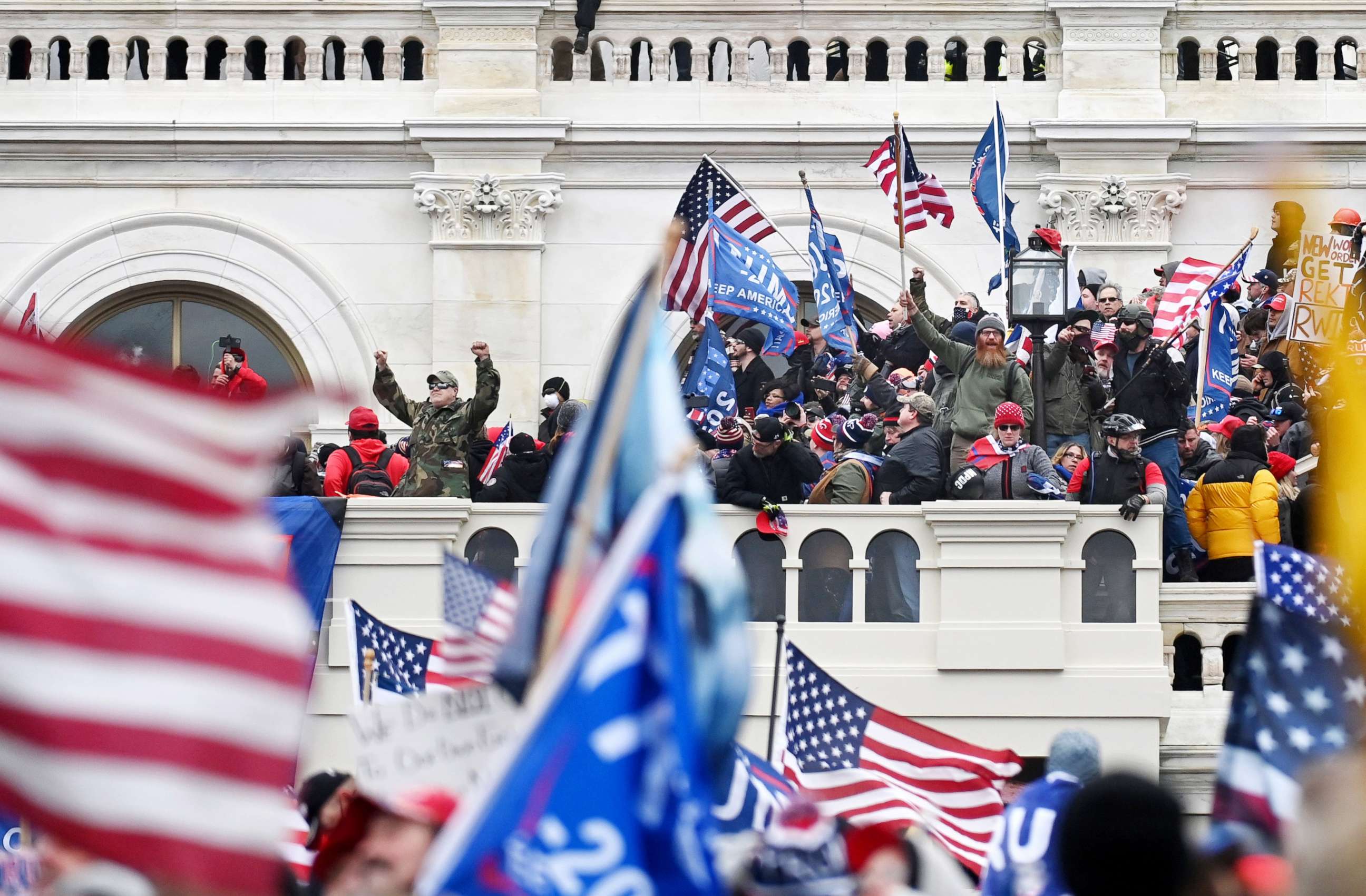 PHOTO: Supporters of President Donald Trump take over balconies and inauguration scaffolding at the United States Capitol, Jan. 06, 2021.