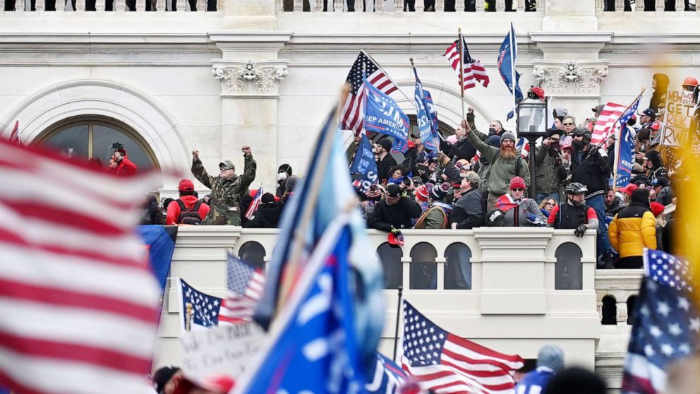 PHOTO: Supporters of President Donald Trump take over balconies and inauguration scaffolding at the United States Capitol, Jan. 06, 2021.