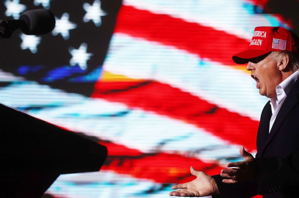 PHOTO: Former President Donald Trump prepares to speak at a rally at the Canyon Moon Ranch festival grounds in Florence, Ariz., Jan. 15, 2022. 