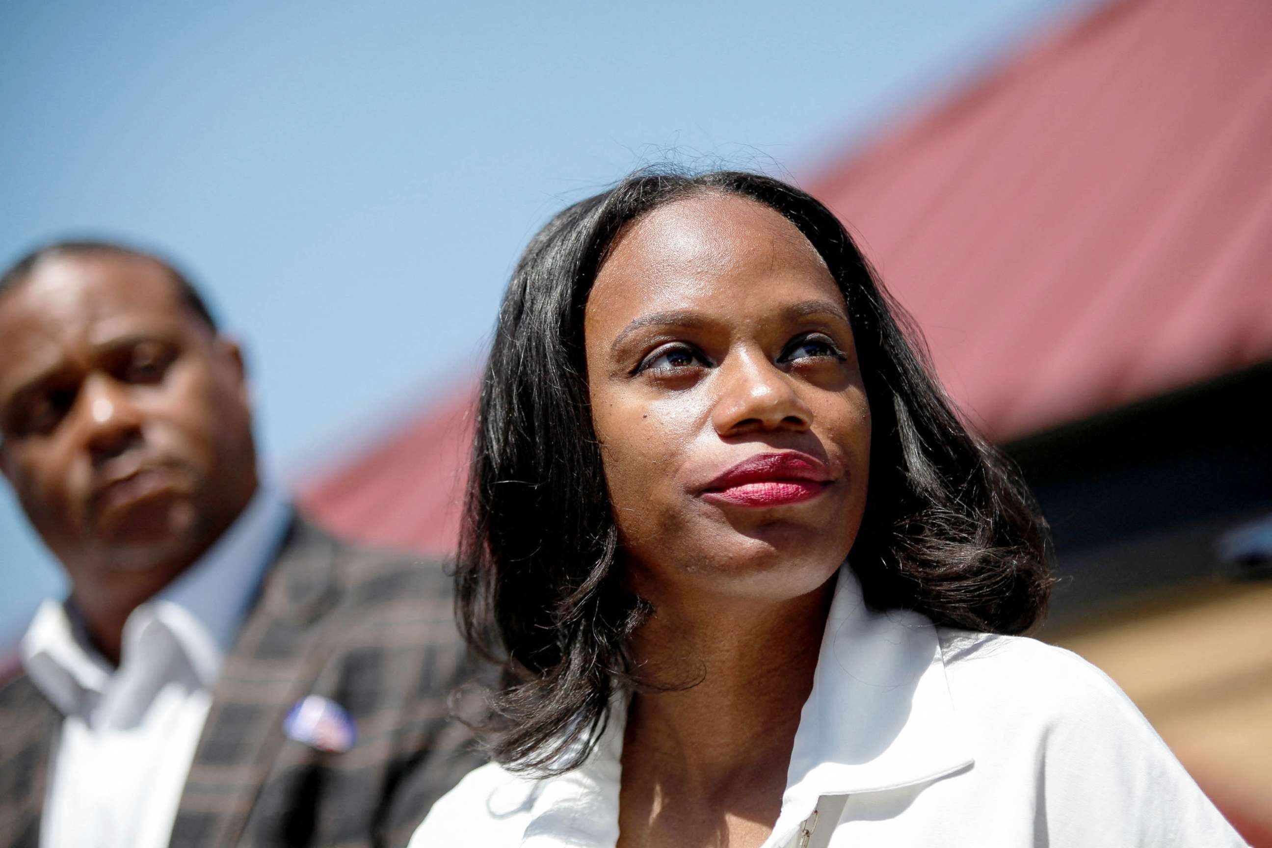 PHOTO: Progressive U.S. House candidate Summer Lee speaks to reporters, alongside Pittsburgh Mayor Ed Gainey, after voting in the primary election at a polling station in Pittsburgh, May 17, 2022. 