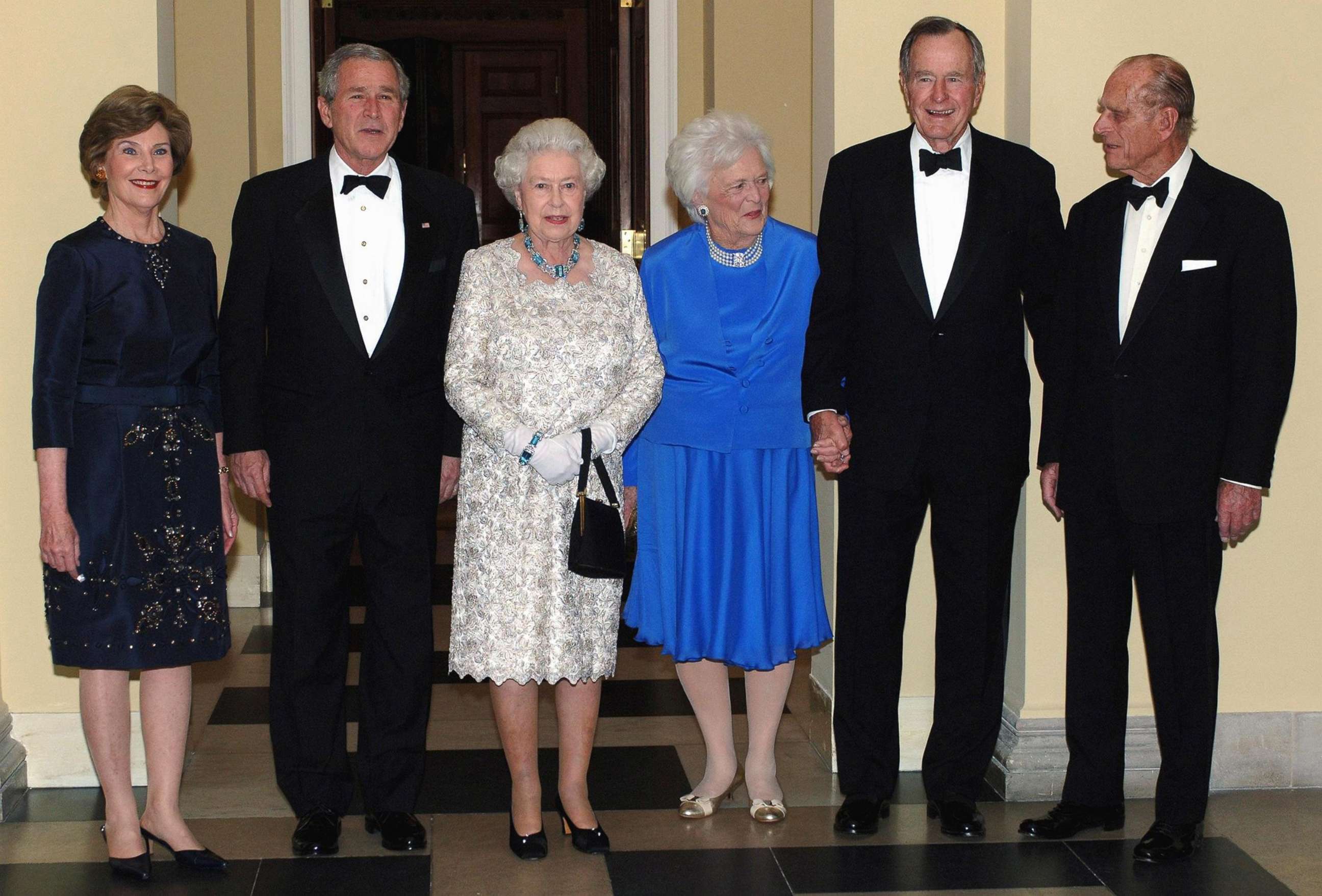 PHOTO: Britain's Queen Elizabeth II and the Duke of Edinburgh, right, stand for a group photo with President George Bush, his wife Laura, as well as his father and former President, George Bush Senior and wife Barbara in Washington, May 08, 2007.