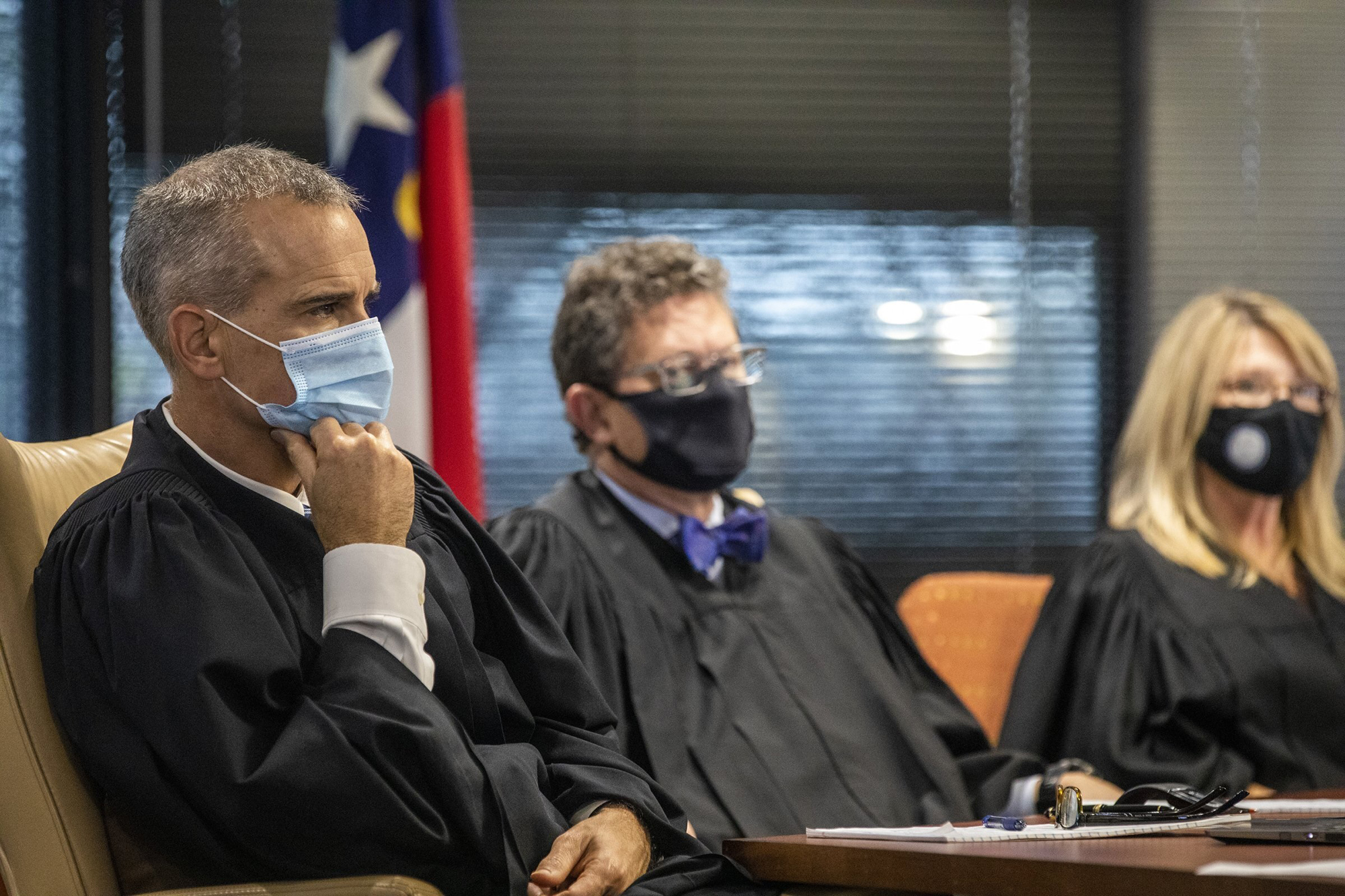 PHOTO: Superior Court Judges Nathaniel Poovey, Graham Shirley and Dawn Layton listen to testimony during a partisan gerrymandering trial over North Carolina's new political maps in Raleigh, N.C., Jan. 3, 2022.