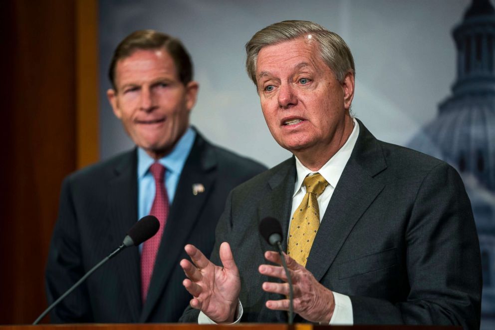 PHOTO: Senator Richard Blumenthal, left, looks on as Senator Lindsey Graham speaks about a bipartisan plan that would limit access to firearms for those seen as an imminent threat to the public, during a press conference in Washington, DC, March 8, 2018. 